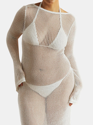 White open-knit maxi cover-up dress with long sleeves and a boat neckline.