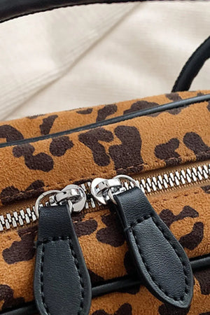 Caramel leopard print barrel bag with double zipper detail