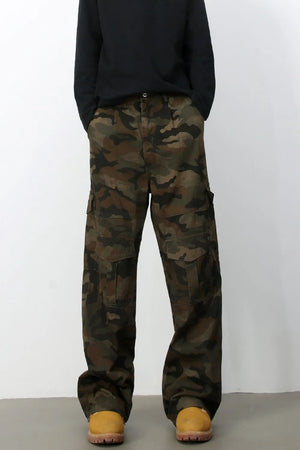 Cargo Camo Wide-Leg Utility Trousers in Green Camouflage with multiple pockets.