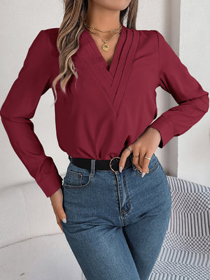 Burgundy pleated V-neckline long sleeve blouse