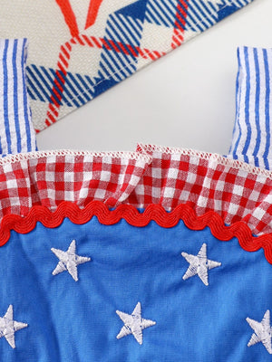 Patriotic baby dress with blue star embroidery, red gingham ruffles, and striped straps.