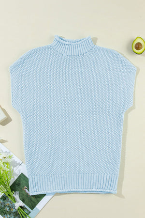 Light blue knit turtleneck shell sweater with short sleeves and a boxy fit.
