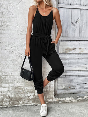 Black chain-strap gathered waist jumpsuit with tie belt and cuffed ankles