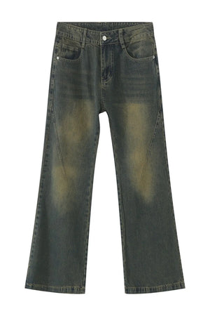 Faded wash flare denim jeans in dark with distressed detailing.