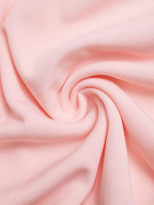 Pink fabric detail of a structured shoulder top with pleated midi skirt set