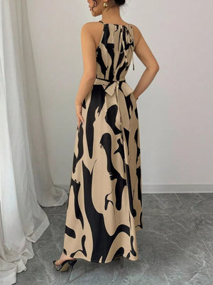 Maxi dress with halter neck, abstract print, and tie waist in khaki and black.