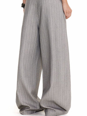Men's grey pinstripe wide leg sweatpants with a flowy fit.