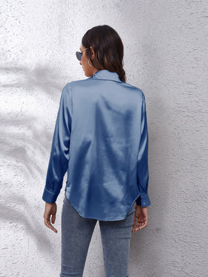 Satin finish button-up shirt in Peacock Blue with a relaxed fit and button cuffs.