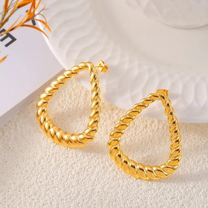 Gold teardrop hoop earrings with rope texture detail