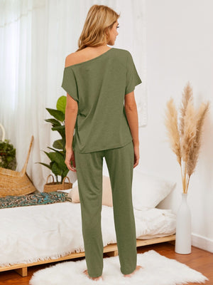 Matcha green loungewear set with asymmetric off-shoulder top and relaxed fit pants.