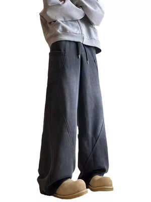 Men's charcoal vintage wash relaxed fit sweatpants with drawstring and pockets.