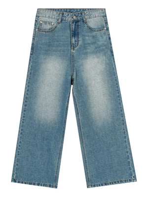Wide-leg denim jeans in medium wash with front pockets and a relaxed fit.