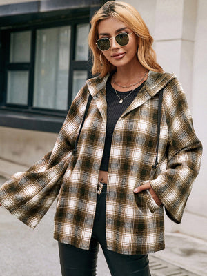 Flared sleeve hooded shacket in camel plaid with drawstring details and pockets.