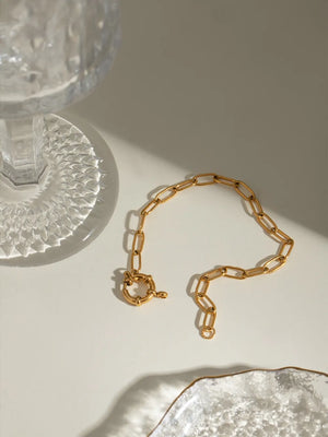Gold chunky link bracelet with circular clasp
