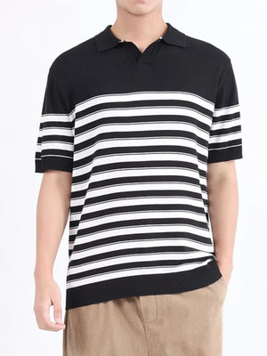 Men's black and white striped knit polo shirt with short sleeves and a spread collar.