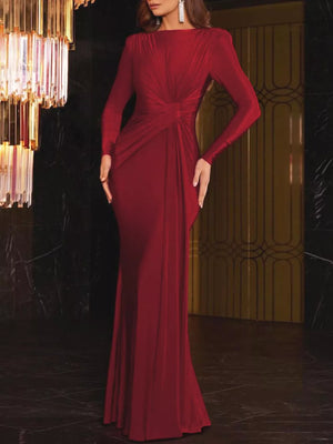 Red ruched long sleeve maxi dress with boat neckline and bodycon fit.
