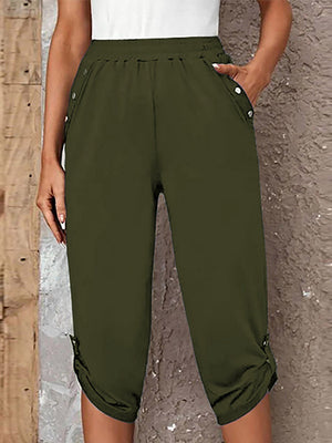 Matcha green culottes with button details on pockets and hem.