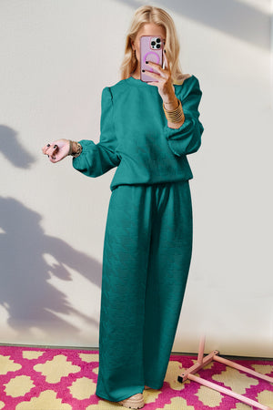Teal chevron knit lounge set with puff sleeves and wide leg pants.