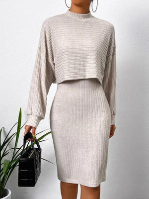 Ribbed knit co-ord set in Dust Storm, featuring a cropped mock neck sweater and a fitted midi skirt.
