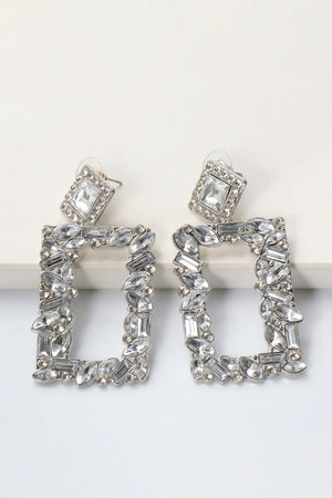 Geometric jewel box earrings with clear crystals and silver alloy.