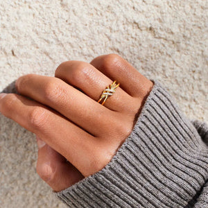 Gold knot ring with diamond accents, 18K gold-plated.