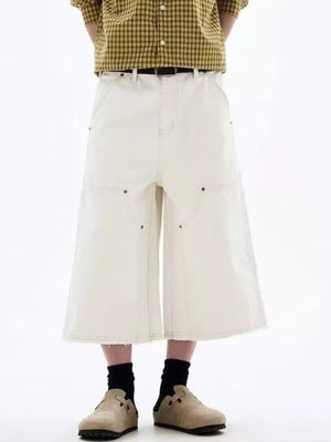 Men's cream cotton wide-leg cropped cargo pants with contrast stitching and raw hem