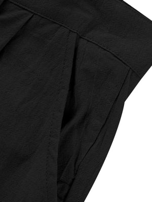 Black relaxed fit sweatpants with pleats and pockets detail.