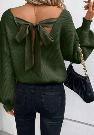 Dark green ribbed knit sweater with a back bow detail and balloon sleeves.
