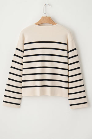 Beige knit cardigan with black nautical stripes and button-up front.