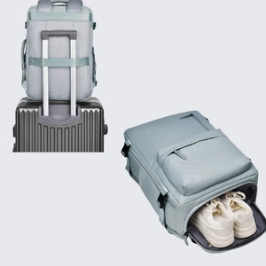 Air Force Blue tech backpack with shoe compartment and integrated compartments, shown on luggage.