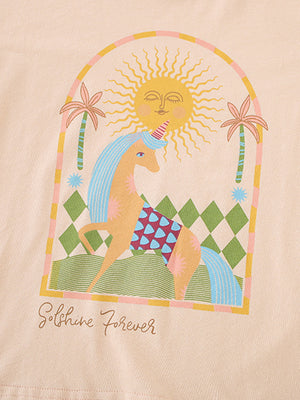 Toddler cotton graphic tee with unicorn, sun, and palm trees, apricot color.