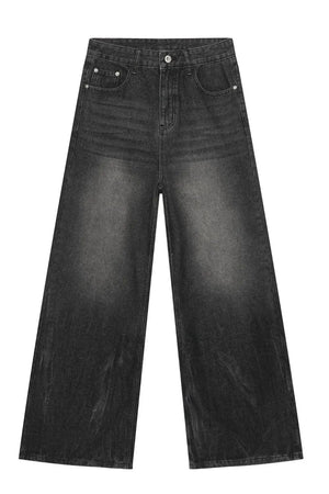 Dark balloon-leg denim jeans with a subtle fade and wide leg