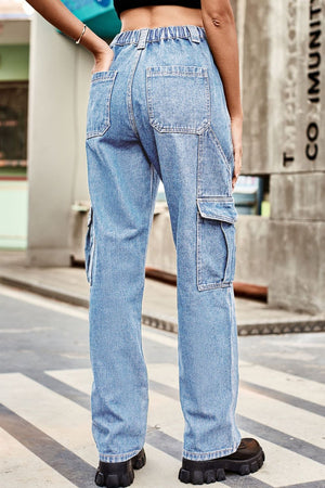 Light wash denim cargo pants with relaxed fit and elastic waistband.