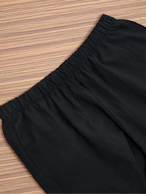 Black relaxed fit wide-leg pants with elastic waistband and pockets