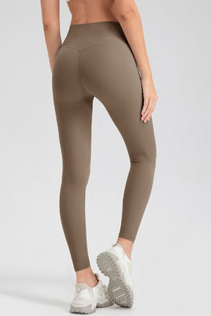 Women's Khaki Sculpted Contour Leggings with V-seam detail.