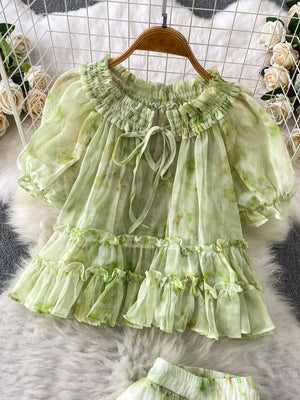 Light green floral ruffle set with bow detail and smocked neckline