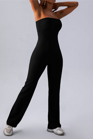 Black ribbed bandeau flare leg jumpsuit with a strapless neckline.