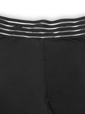Black crossover waistband flare leggings with layered elastic detail