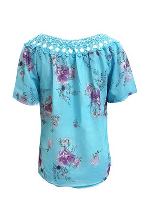 Blue floral blouse with lace yoke and short sleeves