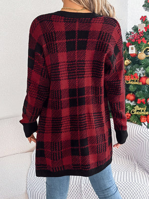 Plaid knit longline cardigan in burgundy and black acrylic with black cuffs and hem.