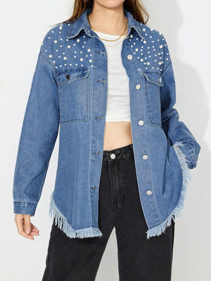 Medium wash denim shirt with pearl embellishments and frayed hem
