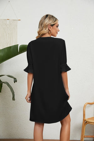 Black V-neck shift dress with flutter sleeves and a casual A-line cut.