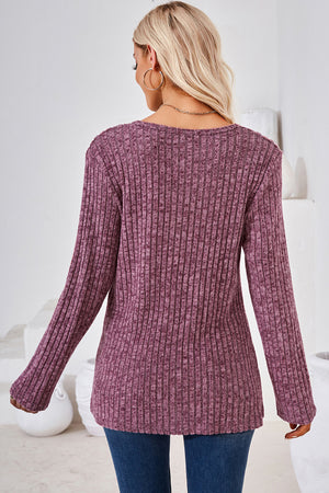 Ribbed knit sweater in Red-Violet with long sleeves and a crew neck.