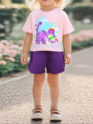 Pink dinosaur graphic toddler t-shirt with heart and volcano scene, lightweight cotton.