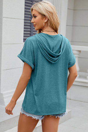 Turquoise Henley hooded tee with rolled short sleeves and a casual fit.