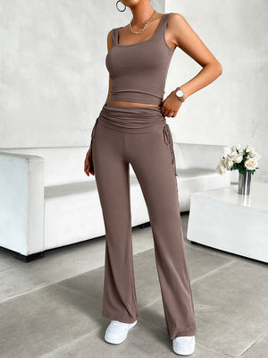 Taupe ribbed ruched waist tank and flare pants set with drawstring details.