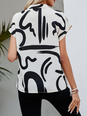 White abstract brushstroke v-neck blouse with short sleeves