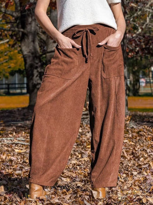 Brown corduroy wide-leg pants with drawstring waist and pockets