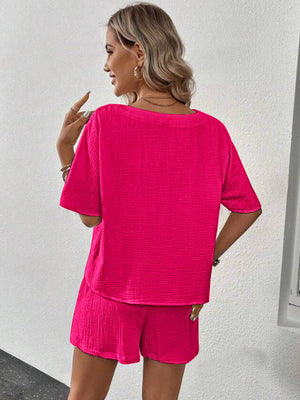 Hot Pink textured gauze lounge set with short sleeve top and shorts.