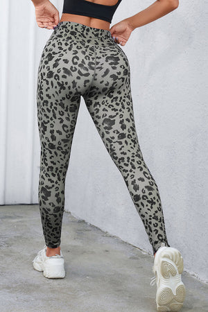 Sculpted leopard print performance leggings in dark gray with a high waist.